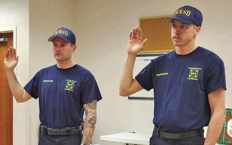 OCESD#1’s newest personnel are pictured as they are sworn in. Left to right are Hunter Bland and Justin Journeay.