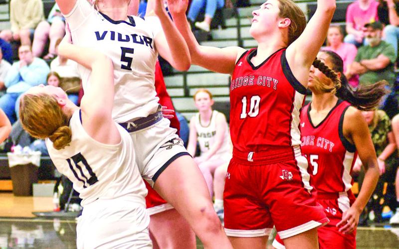 Rebound Senior Lady Pirates Natalie Morrison, #10 and Raegan Stephenson, #5 battle for a rebound in Friday’s final basketball game of the season.