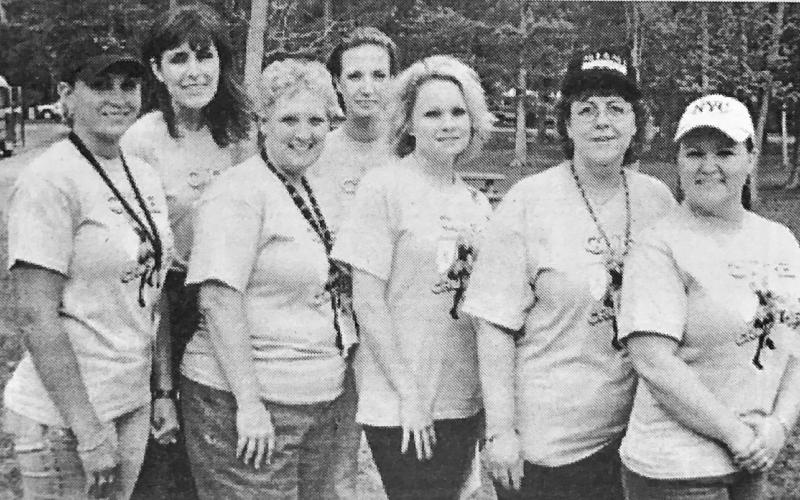 Pictured are VMS staffers, front, Lori Matthews, Debbie Rhodes, Shanna Granger, Susan Richards, Cheryl DuPuy: back, Dana Bourque and Kim Isom. In April, Vidor Middle School Students and staff put a 'CAP ON CANCER'. The $1 donation helps support the VMS Relay for Life Team. Archive Photo