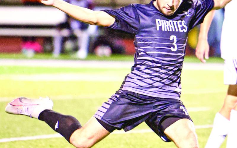 AJ Wise getting his kicks AJ Wise puts his leg into it as he drives forward in Friday’s district match with Silsbee,