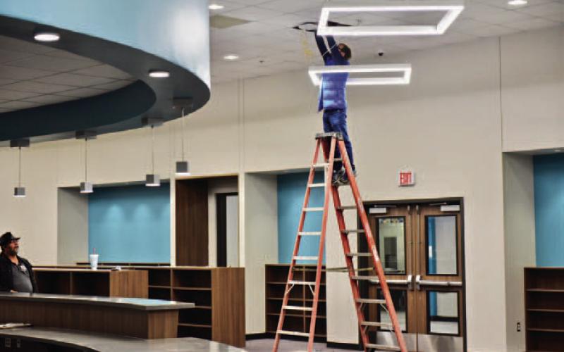 The Oak Forest Elementary library receives a few finishing touches last week.