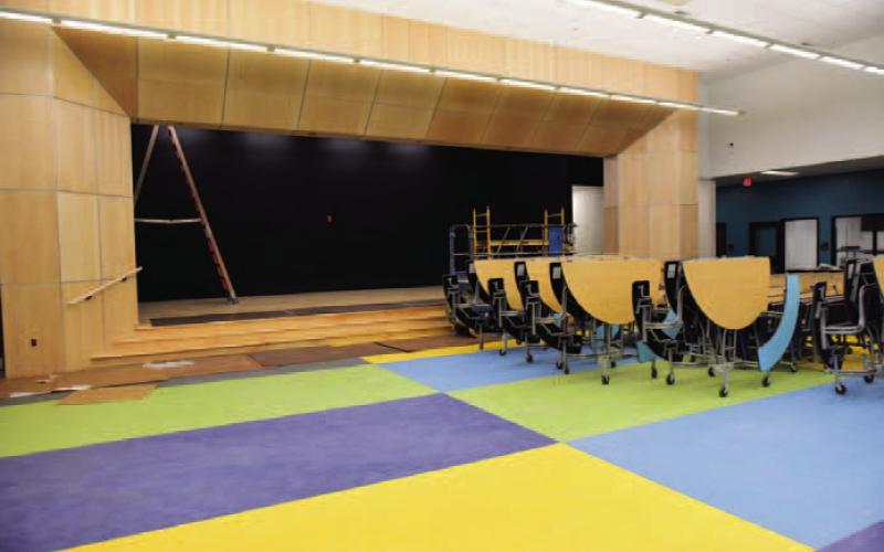 The stage and cafeteria area of the new school.