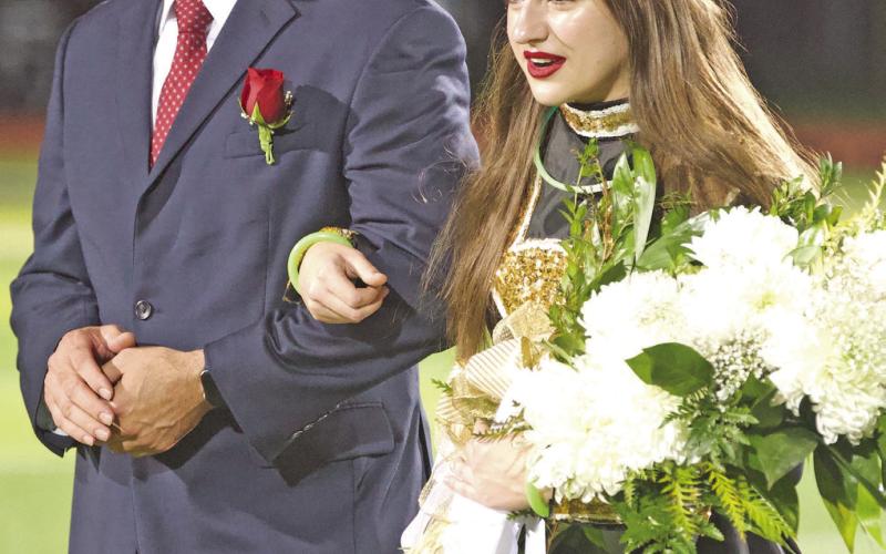 VHS senior Tamra Harris was crowned as the 2023 Vidor High School Homecoming Queen Friday in unplanned pre-game festivities. Due to the failure of a portion of the field lighting, all halftime activities were held before the kickoff, which was delayed almost 90 minutes due to the malfunction.