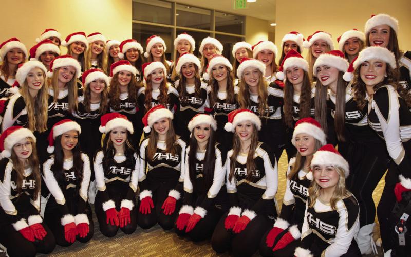 The Vidor High School Brigadettes, dressed in bright holiday garb, wowed the crowd with their synchronized hand routines set to holiday music at their Vidor City Hall performance under the direction of Cherise Fawcett.
