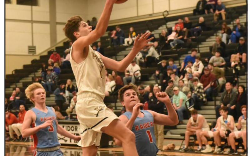 Branson Healy makes his move in Tuesday’s junior varsity game versus Lumberton. Photo by Randall Luker