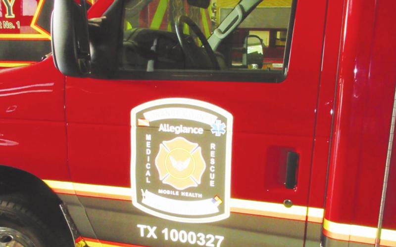 The new Allegiance Mobile Health ambulances are painted fire-engine red and have the words “Orange County Emergency Services District No. 1” prominently painted on their sides. They start rolling out for emergency services in the fire district on August 16th. Photo by George Garza