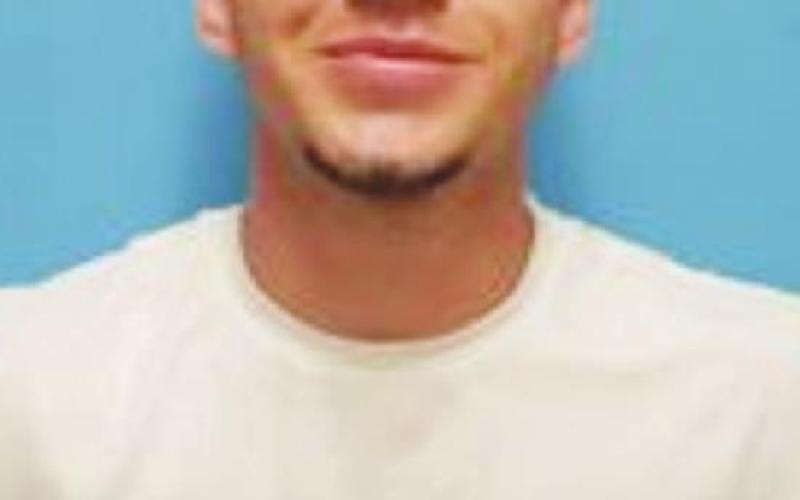 Man arrested for narcotics after displaying gun
