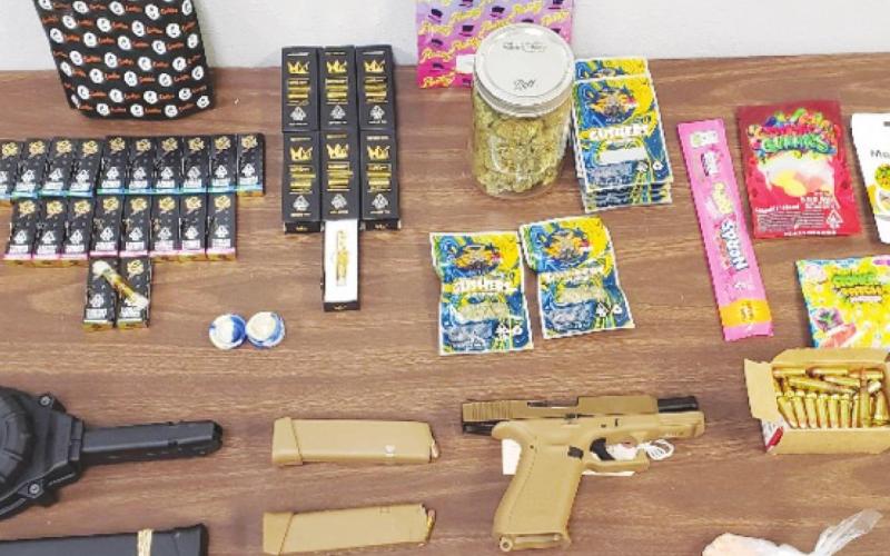 Man arrested for narcotics after displaying gun