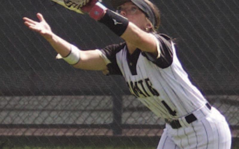 Alyssa Korman catches a fly on the run to end the inning late in the game Tuesday.