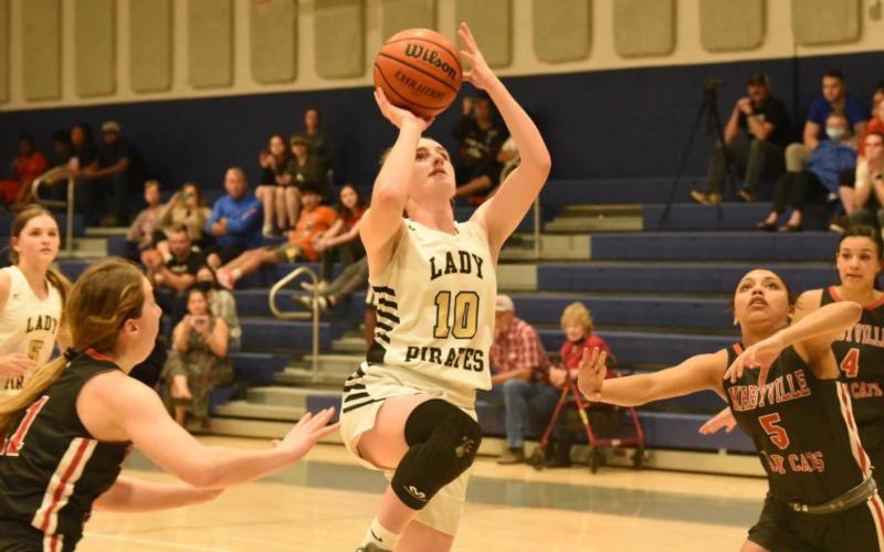 Natalie Morrison shoots for two in the Championship round of the WOS Tournament Thursday. Photo by Randall Luker