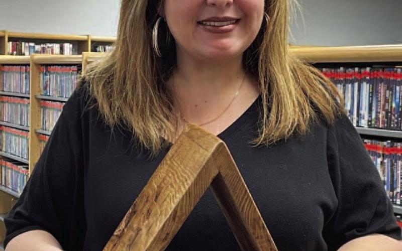 The winner of the Vidor Public Library drawing for the oak book stand is Tamra Barney. The book stand was donated to the library by Chris Screws of 1 of 99 Woodcrafts. The proceeds will help support the Summer Reading Program 2023. Courtesy Photo