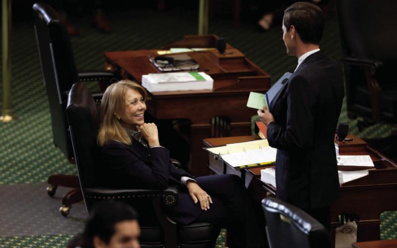 Senator Joan Huffman, R-Houston, speaks with Senator Mayes Middleton, R-Galveston, during a Texas Senate meeting on Budget Day, March 25, 2025. Credit: Lorianne Willett/The Texas Tribune