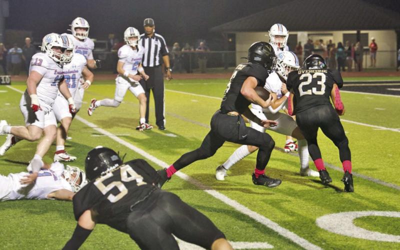 Pirate RB Dane Villadsen heads for the end zone and a touchdown behind the blocking of Jayden Jones, #23.