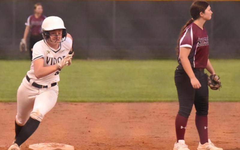 Natalie Morrison lights the afterburners as she sprints for home plate and a score in Tuesday’s game versus Silsbee. Photo by Randall Luker