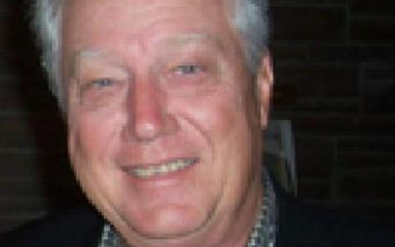 Ask Rusty – My Husband Still Works; Must He Enroll in Medicare at age 65?