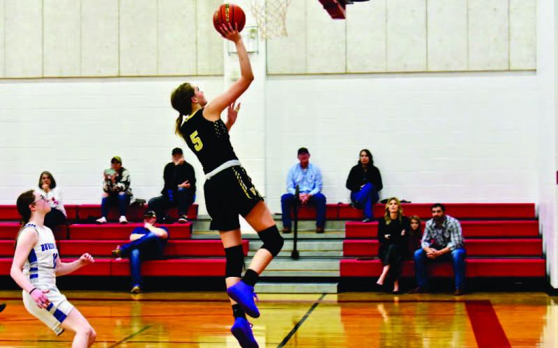 Raegan Stephenson make a layup in the Lady Pirates game versus Burkeville.