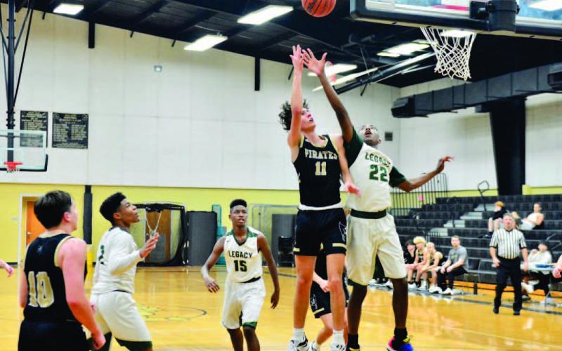 Zander Lindsey takes his shot over a Legacy player Saturday in Nederland. Photos by Randall Luker