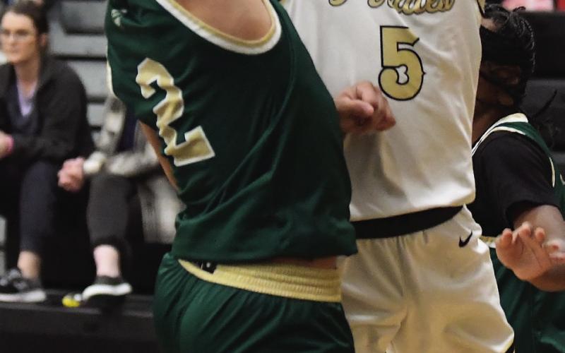 Bryce Loftin splits the Bear defense to score Friday versus LCM.