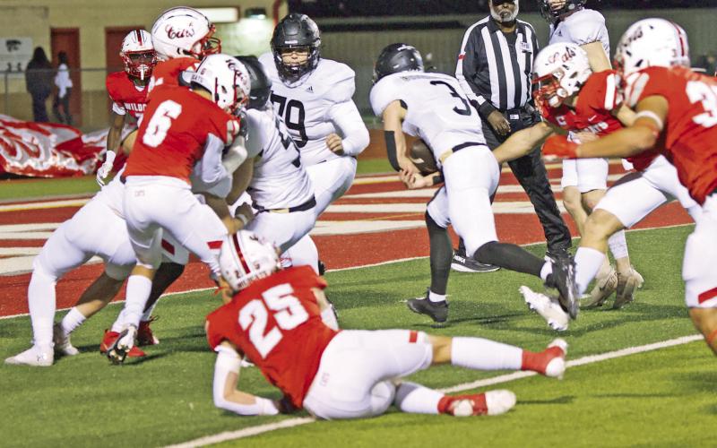 The Pirate offensive line clears the way for Isaac Fontnow in Friday’s away game at Splendora.