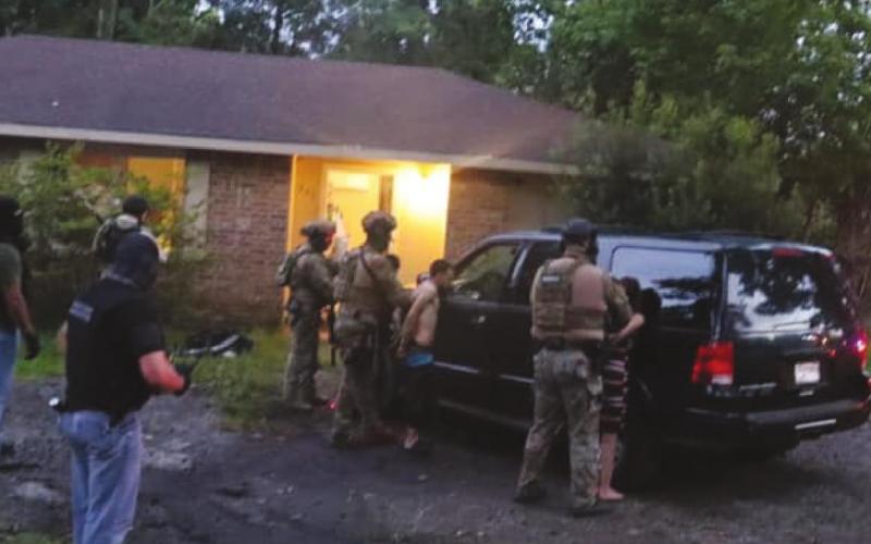 Bluebird Street raid nets heroin, methamphetamine