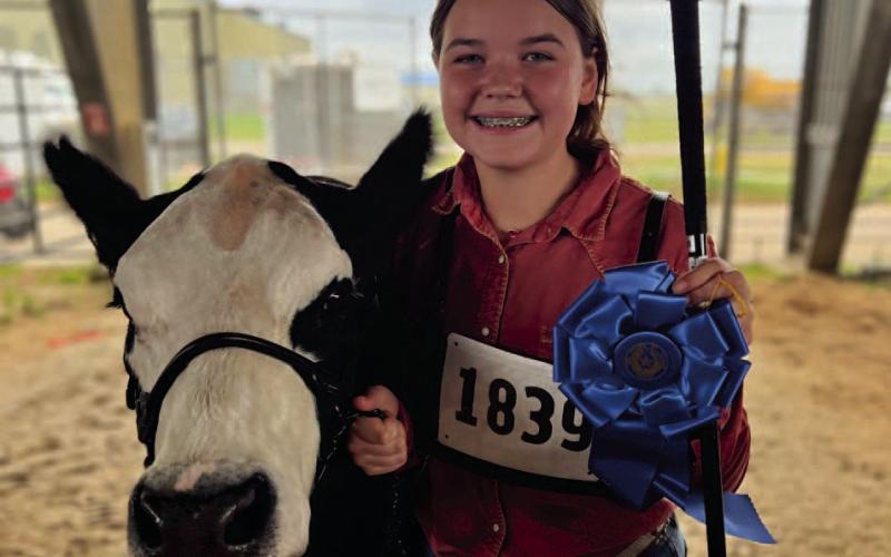 Laney Domec was Reserve Breed Champion with her heifer.