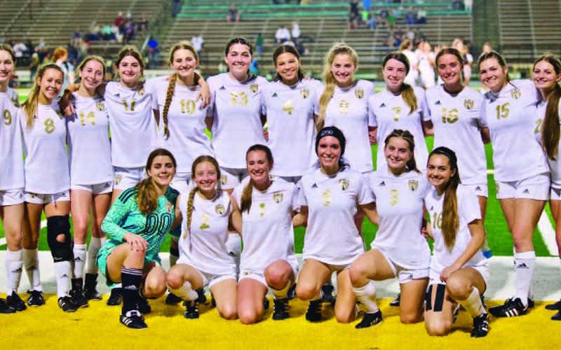 The varsity Lady Pirate soccer team has clinched a spot in the state playoffs for the 14th consecutive year under the leadership of Coach Ralph Fields. The lady Pirates defeated the LCM Lady Bears 4-3 Friday to secure their playoff spot. Photo by Randall Luker