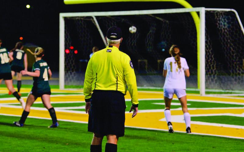 Jordyn Fowler, right, watches as the ball she had just crossed to Kenya Correia hits the back of the net for Vidor’s game winning goal against LCM. Photo by Randall Luker