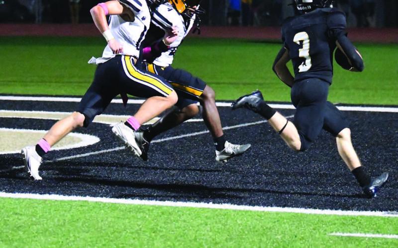 Landon Jones scores on a three-yard run in the third quarter.