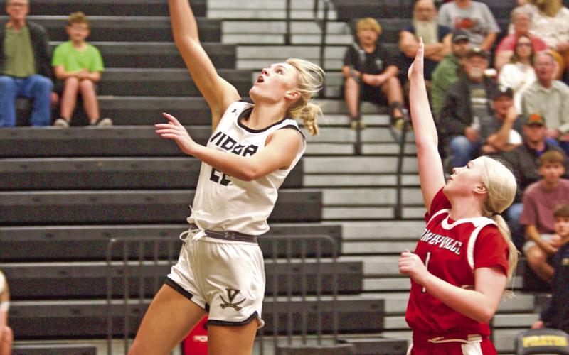 Varsity Lady Pirate Jaelyn Justice shoots a layup in Monday’s home game versus the Deweyville Lady Pirates.