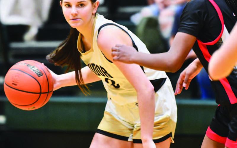 Allie Williams makes a break for the basket.