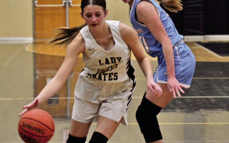 Lady Pirate Madison Powell drives on the goal in Friday’s district opener versus Lumberton. Photo by Randall Luker