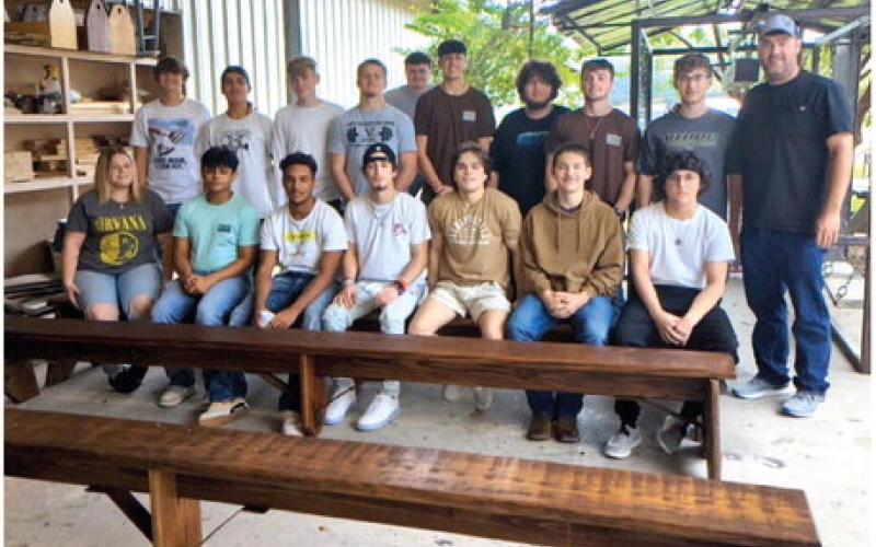 Mr. Hartman's Building Trades Classes at Vidor High School have constructed three 12 foot benches for @Vidor Middle School VMS students to sit on while they wait for their parent rides in the afternoons. The benches are braced and stained with the ever-popular 'Early American' color stain. Great job to the Building Trades students and Mr. Hartman on a beautiful wood project! VISD Courtesy Photo