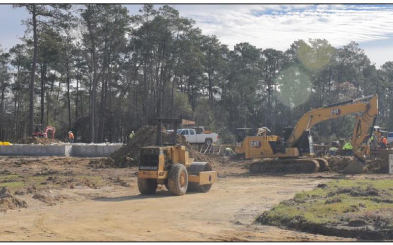 Next door to Oak Forest Elementary on Highway 12, work on the Vidor Middle School site has visibly accelerated over the past few weeks as work is now above ground. Beams, far left, are being poured on top of the underground piers and soon the foundation pours will begin by section. February 2023 is the target date for completion. Photo by Randall Luker