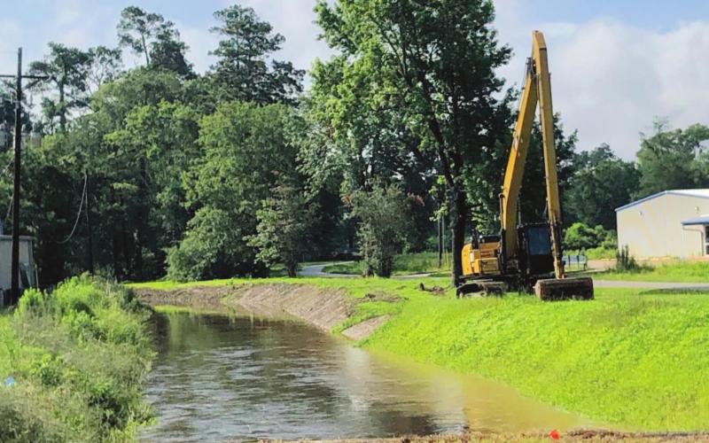 Drainage work is continuing across Orange County with ditches and outfalls being cleared, cleaned and de-snagged to remove impediments to drainage. Vegetation is being cleared from Cow Bayou Lateral #5 at the SH 12 crossing and shows a sharp contrast where work has been completed.