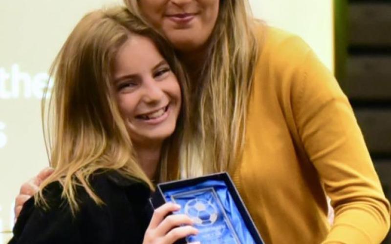 Hope Diley received the Heart of the Lady Pirates Award in soccer from Coach Sampere.