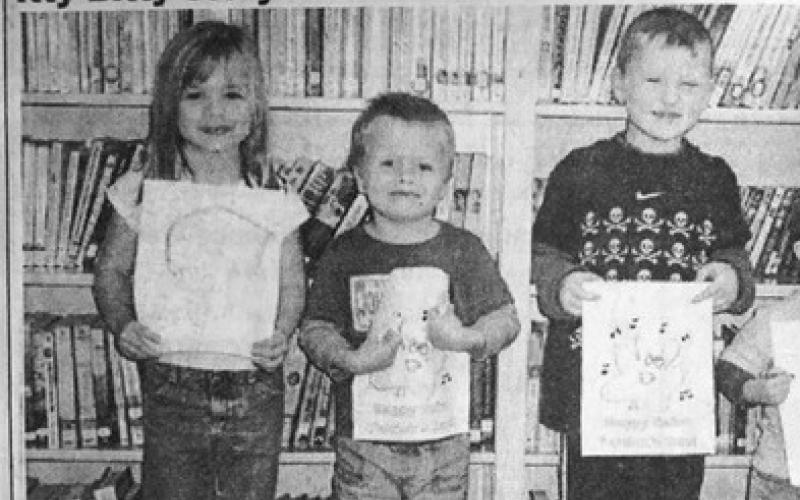 Vidor Public Library's Itty Bitty story time was held on Thursday, March 6. Assistant Director, Colette Turner read 'Library Lil' by Suzanne Williams to the children. Pictured are Kaylie Trinkle, Jeremy Trinkle, Leven Barney and Jeffery Livingston with their books they made. Archive Photos