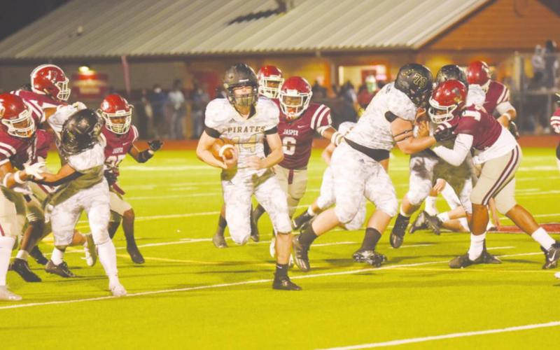 Pirate linemen cleared the way for RB Jason Watson to pick up a Pirate first down.
