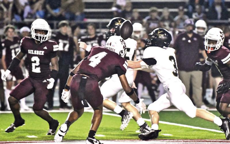 Landon Jones didn’t break stride as he regained control of the ball a Silsbee player had hit and knocked out of his grasp on his way to a first down.