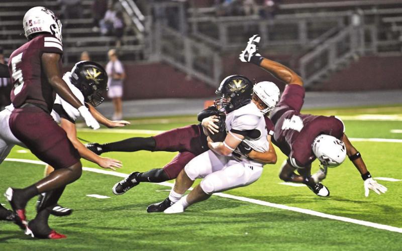Riley Marlow drug, pulled ,and plowed through the Silsbee defense to pick up a first down Friday.