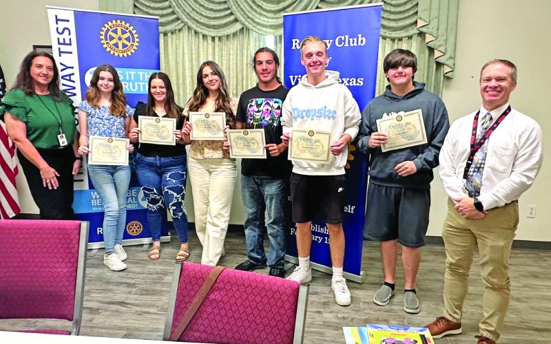 Vidor High School October Students of the Month were honored with a luncheon Monday during the Rotary Club of Vidor Texas meeting. Each student received a certificate of recognition and a Rotary Challenge coin. The Rotary Club also placed a book on the Green Bus in honor of each of these students. Pictured with Dr. Malveaux and Dr. Killgo are: 9th: Jessica Broadway and McKenzie Grass 10th: Walter Arrant and Eli Zapata 11th: Leonard Schafer 12th: Olivia Avery