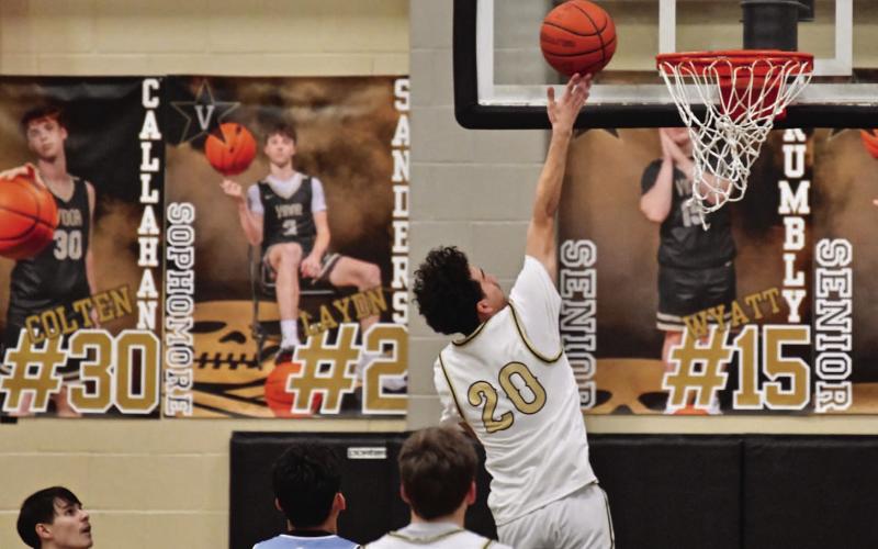Bryson Aguilera, just moved up from jv, lays up two before the half.