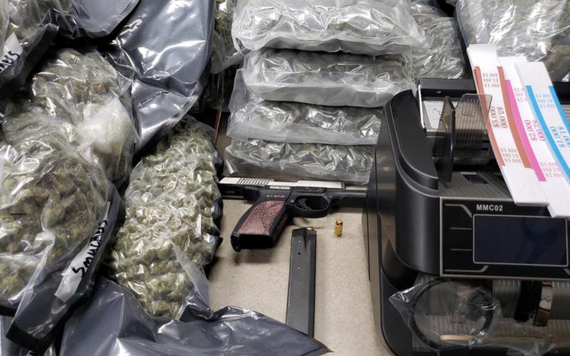 Driver crashes flees leaving weed and stolen pistol