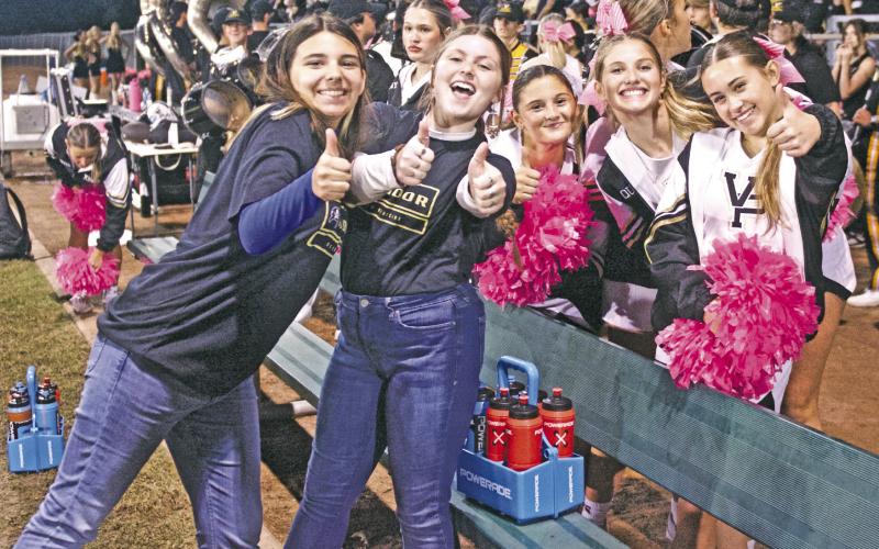VHS varsity cheerleaders and athletic trainers were in high spirits Friday after Pirates’ three touchdown 3rd quarter that propelled Vidor to a 31-21 district win over the Livingston Lions.