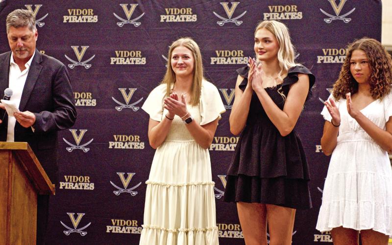 VHS Girls Athletic Coordinator Shad Smith presented the awards for Heart of the Lady Pirates and Outstanding Female Athlete at the Lady Pirate Athletic Awards ceremony Tuesday. Pictured are left to right, Smith, Madison Powell, Raegan Stephenson and Kenya Correia.