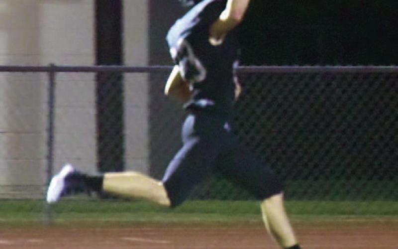 Dane Villadsen outran the defense and broke free down the left sideline for a TD to put the Pirates up 38-14 Friday at home. Photo by Randall Luker