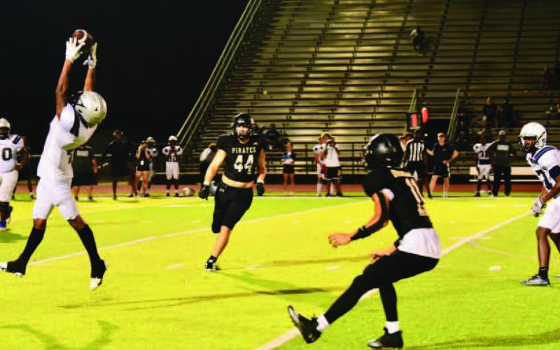 Bryce Dubose, #11, was in the right place at the right time to pick off this overthrown ball in Thursday’s scrimmage with the WOS Mustangs. Photo by Randall Luker