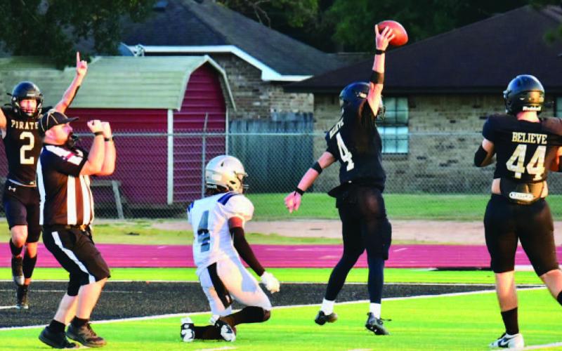 Aiden Villafano shows the ball as he intercepted a Mustang pass inside the five yard line to stop a WOS drive. Photo by Randall Luker