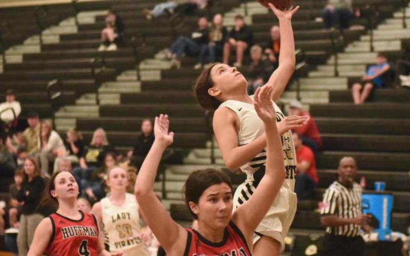 Lady Pirate Sofia Rodriguez takes her shot in Friday’s game versus Huffman. Photo by Randall Luker