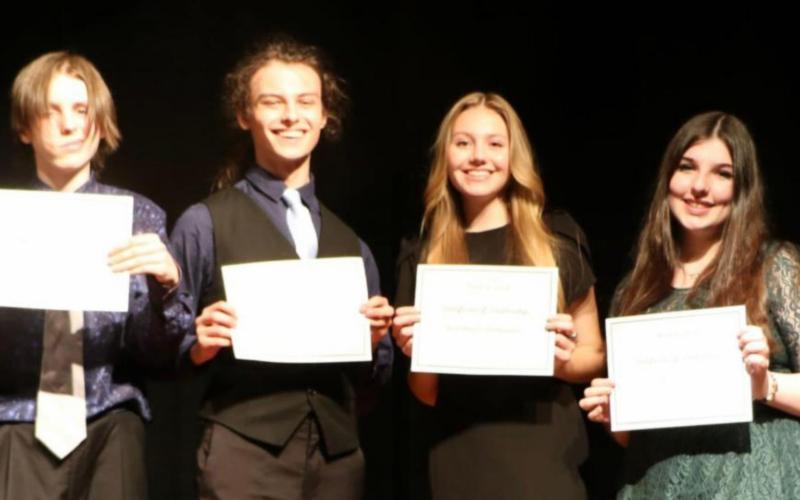 Winners at Vidor High School - February 7, 2022. From left to right: Cameron Cain (2nd Place in Interpretive Reading), Triston Tinkle (1st Place in Interpretive Reading), Ashley Callahan (1st Place in Declamation), and Brenna Wingate (2nd Place in Declamation). Courtesy Photos