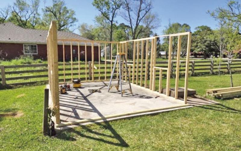 The greenhouse framing utilizes non-treated 2 x 4 x 8 lumber from a friend’s lumber stockpile. The 2 x 4’s (studs) were anchored onto a base plate at 2-foot centers. The lumber used for the base plates are weather resistant boards (image: John Green).